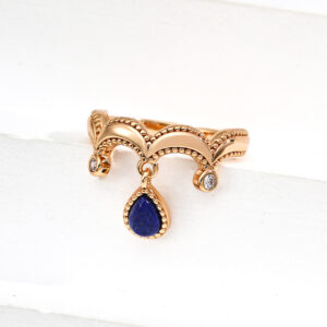 The Oracle’s Whisper Set showcases a harmonious blend of deep blue Lapis Lazuli and vintage gold, featuring the Oracle’s Echo Earrings and Seer’s Vision Ring. The set is designed to empower wearers with wisdom, enhance communication, and provide a sense of serenity, aligning perfectly with the transformative energies of 2025.