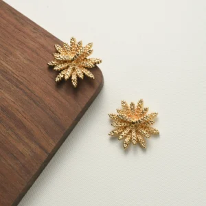 Gold wheat-shaped vintage earrings symbolising harvest, abundance, and elegant femininity. Be the gliding grace.