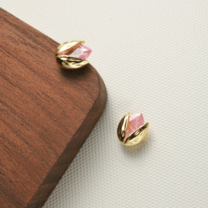 Golden petal earrings with green or pink gem like budding wishseed. Be the Gliding Grace.