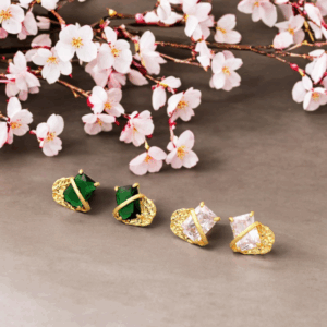 Gold earrings with wrapped gemstone orbit motif. Be the Gliding Grace.